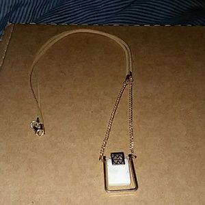 Gold trim and white ivory necklace